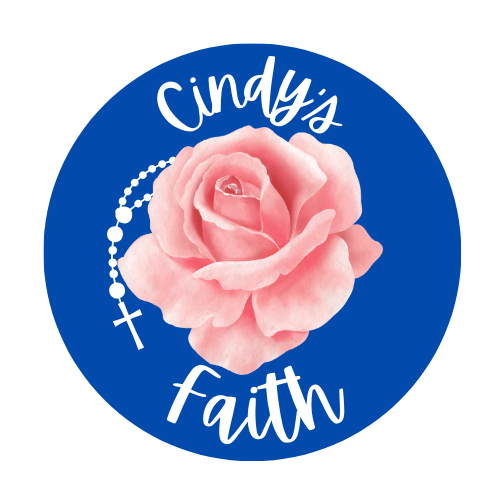 A blue circle in the middle is a pink rose and a rosary with the words Cindy's Faith